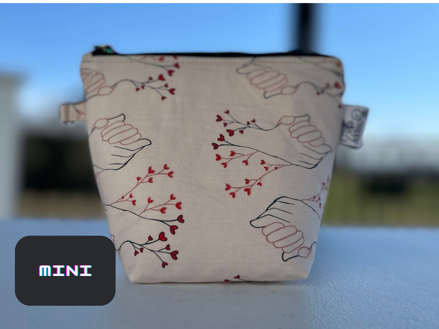 Hearts and Hands Zipper Pouch